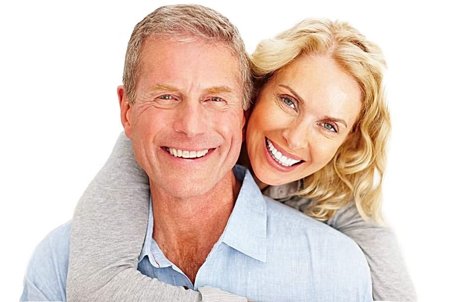 Dental Implants - Older couple smiling with dental implants