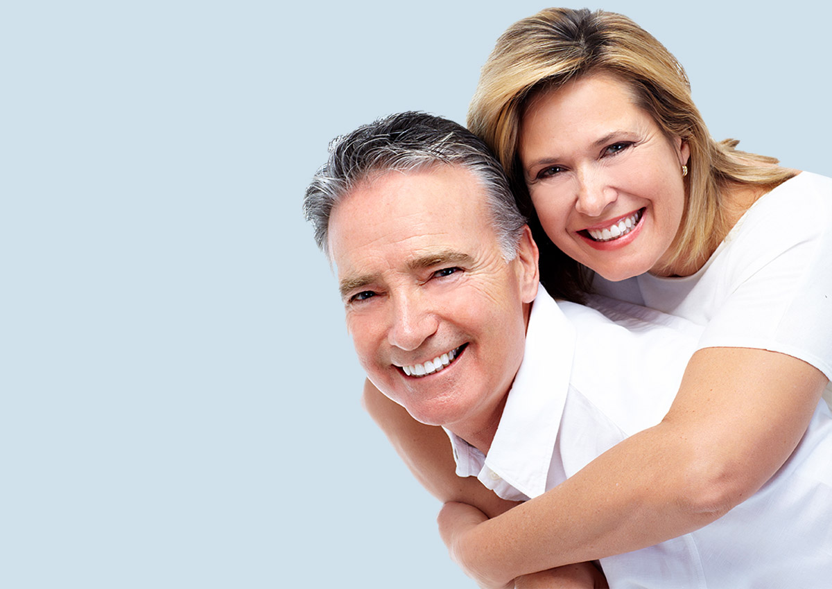 Crowns and Bridges - TRUST Dental An older couple with dental crowns